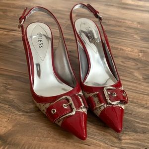 Women’s red and tan Guess heels.